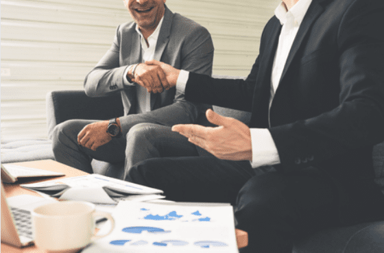 Business people discussing around a coffee table