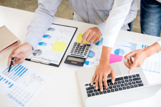 People working together on financial documents